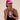 Woman on beach eating Off The Walnut Sattva Vida Energy Bites